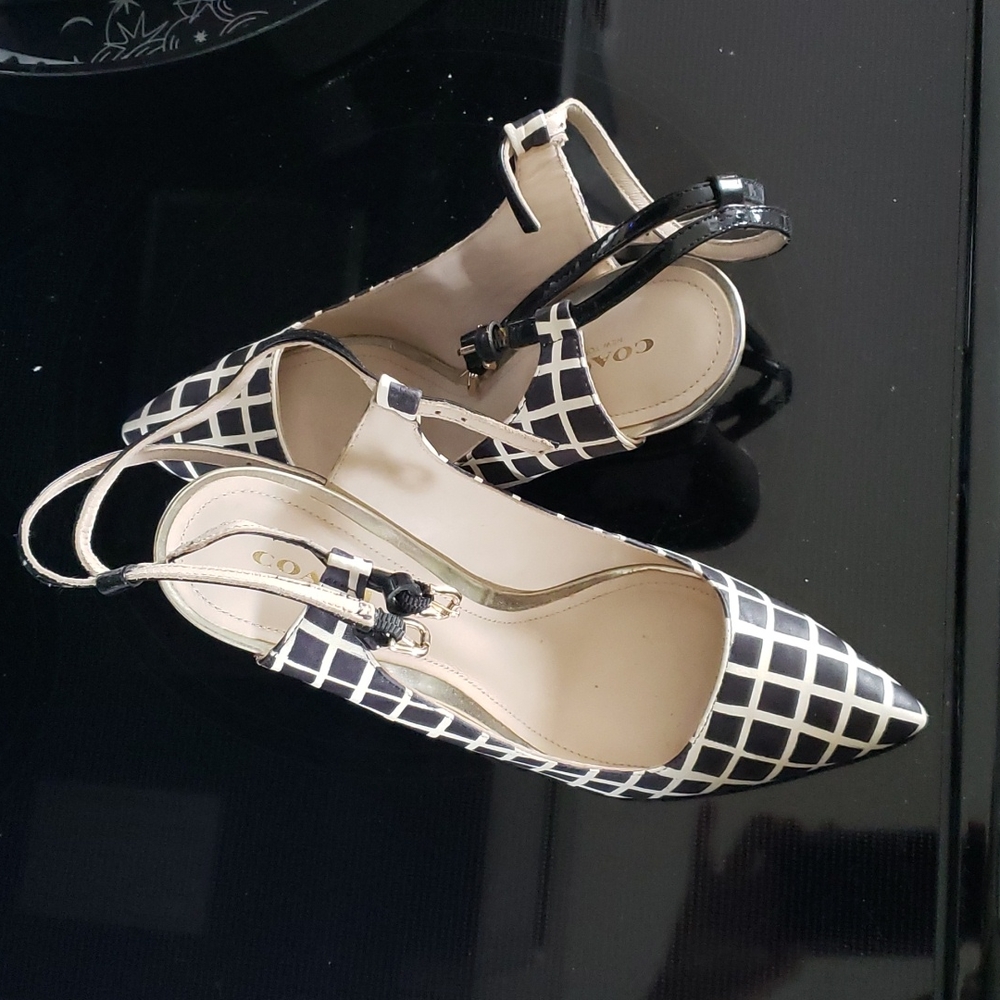 Coach 7.5 size black and white checkered wedge strappy heel.